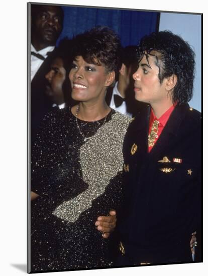 Singers Dionne Warwick and Michael Jackson at the Grammy Awards-null-Mounted Premium Photographic Print