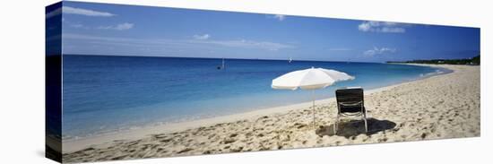 Single Beach Chair and Umbrella on Sand, Saint Martin, French West Indies-null-Stretched Canvas