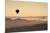 Single Hot Air Balloon over a Misty Dawn Sky, Cappadocia, Anatolia, Turkey, Asia Minor, Eurasia-David Clapp-Mounted Photographic Print