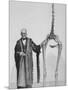 Sir Richard Owen Poses Beside the Skeleton of a Moa-null-Mounted Photographic Print