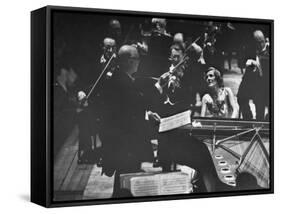 Sir Thomas Beecham Conducting Orchestra as Lady Beecham Plays Piano-Michael Rougier-Framed Stretched Canvas