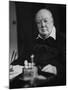 Sir Winston Churchill, Sitting Behind Desk at Chartwell-null-Mounted Photographic Print