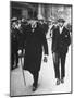 Sir Winston Churchill Walking in Street with Sir James Grigg, His Parliamentary Private Secretary-null-Mounted Photographic Print