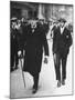 Sir Winston Churchill Walking in Street with Sir James Grigg, His Parliamentary Private Secretary-null-Mounted Photographic Print