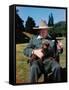 Sir Winston Churchill Wearing Straw Hat while Holding Pet Poodle at Chartwell Manor-Hans Wild-Framed Stretched Canvas