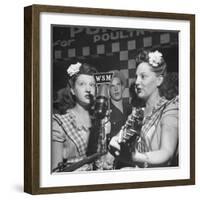 Sisters Performing at the Microphone at the Grand Ole Opry-Ed Clark-Framed Premium Photographic Print