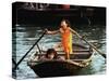 Sisters Who Live with Their Family on Halong Bay, Vietnam, Row Their Boat out to Greet Tourists-null-Stretched Canvas