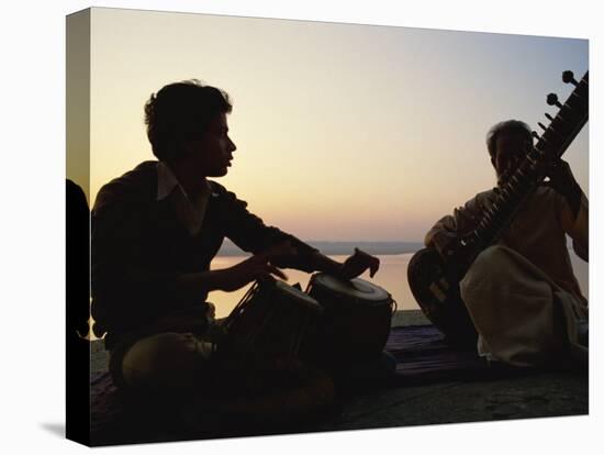 Sitar and Tabla Player Beside the Ganga River, Varanasi, Uttar Pradesh State, India-John Henry Claude Wilson-Stretched Canvas