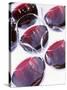 Six Glasses of Red Wine Against White Background-Linda Burgess-Stretched Canvas