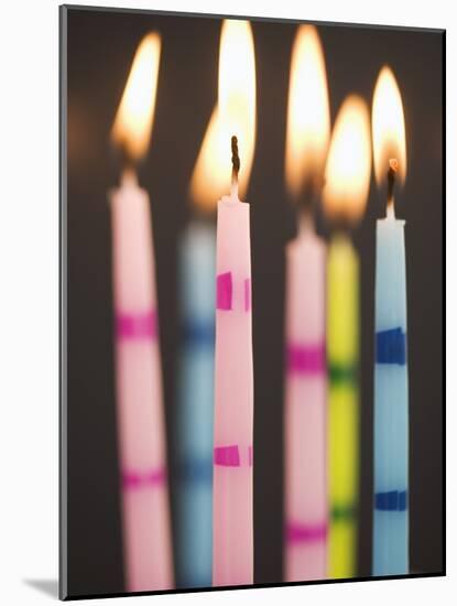 Six Lit Birthday Candles-Tom Grill-Mounted Photographic Print