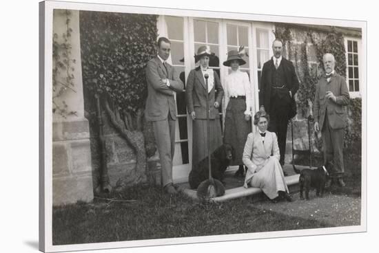 Six People with Two Dogs in a Garden-null-Stretched Canvas