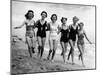 Six Women, in Swimsuits, Run in a Row Along a Beach, 1942-null-Mounted Premium Photographic Print