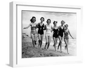 Six Women, in Swimsuits, Run in a Row Along a Beach, 1942-null-Framed Photographic Print