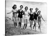 Six Women, in Swimsuits, Run in a Row Along a Beach, 1942-null-Stretched Canvas