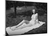 Sixteen Year Old Girl Sun Tans on a Blanket, Ca. 1944-null-Mounted Photographic Print
