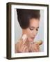Sixties Woman with Compact-null-Framed Art Print