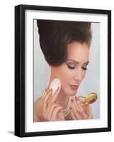 Sixties Woman with Compact-null-Framed Art Print