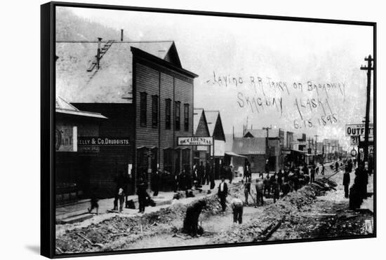 Skagway, Alaska - Laying Railroad Track on Broadway-Lantern Press-Framed Stretched Canvas