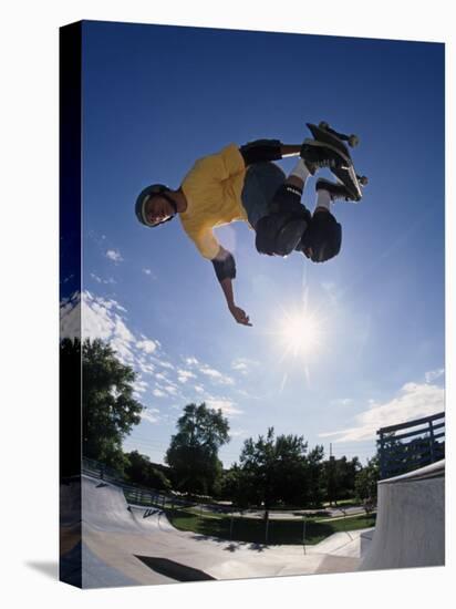 Skateboarder in Action on the Vert-null-Stretched Canvas