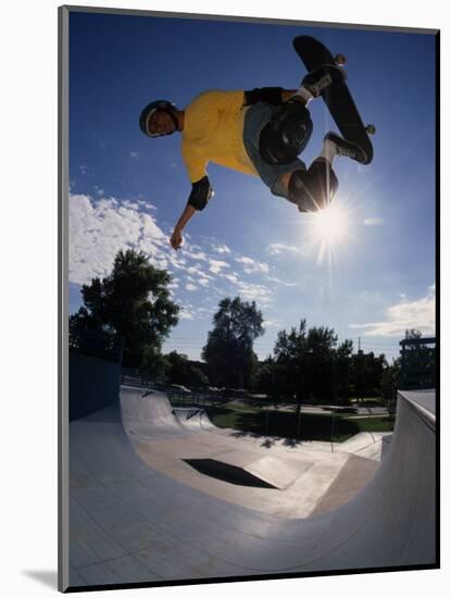 Skateboarder in Action on the Vert-null-Mounted Photographic Print