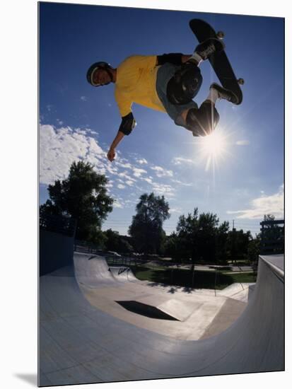 Skateboarder in Action on the Vert-null-Mounted Photographic Print