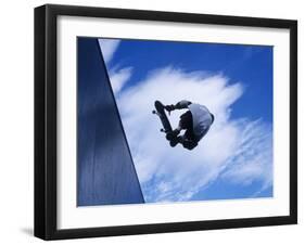 Skateboarder in Action over the Vert-null-Framed Premium Photographic Print