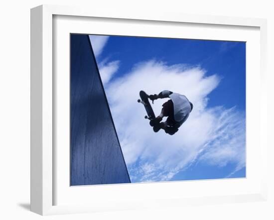 Skateboarder in Action over the Vert-null-Framed Photographic Print