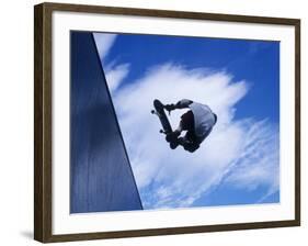 Skateboarder in Action over the Vert-null-Framed Photographic Print