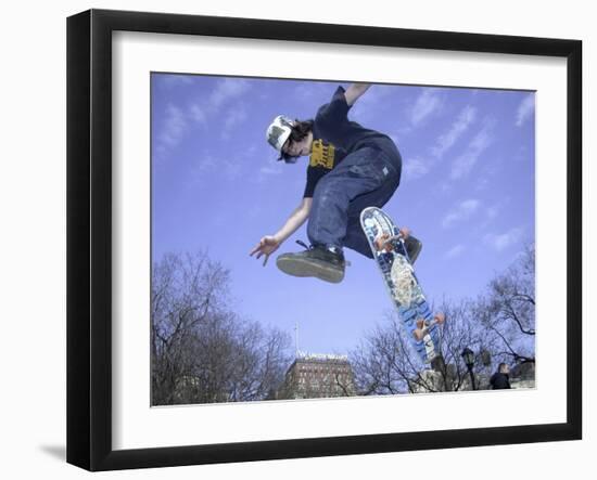 Skateboarder in Midair Doing a Trick-null-Framed Premium Photographic Print