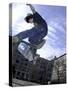 Skateboarder in Midair Doing a Trick-null-Stretched Canvas
