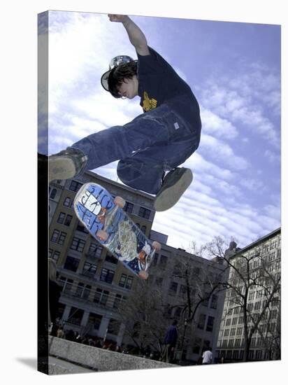 Skateboarder in Midair Doing a Trick-null-Stretched Canvas