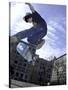 Skateboarder in Midair Doing a Trick-null-Stretched Canvas