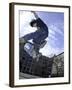 Skateboarder in Midair Doing a Trick-null-Framed Photographic Print