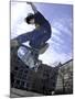 Skateboarder in Midair Doing a Trick-null-Mounted Photographic Print