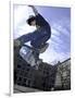 Skateboarder in Midair Doing a Trick-null-Framed Photographic Print