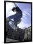 Skateboarder in Midair Doing a Trick-null-Framed Photographic Print