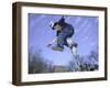 Skateboarder in Midair Doing a Trick-null-Framed Photographic Print