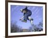 Skateboarder in Midair Doing a Trick-null-Framed Photographic Print