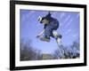 Skateboarder in Midair Doing a Trick-null-Framed Photographic Print