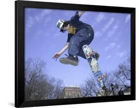 Skateboarder in Midair Doing a Trick-null-Framed Photographic Print