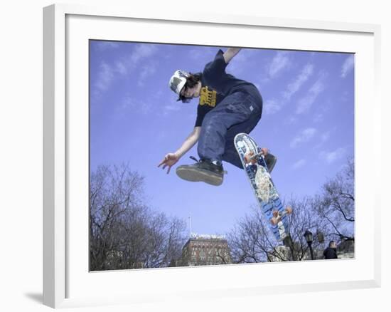 Skateboarder in Midair Doing a Trick-null-Framed Photographic Print