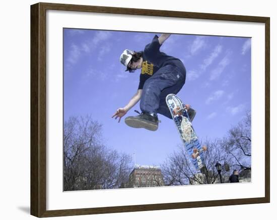 Skateboarder in Midair Doing a Trick-null-Framed Photographic Print