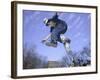 Skateboarder in Midair Doing a Trick-null-Framed Photographic Print