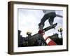 Skateboarder in Midair Knocking Over a Cone-null-Framed Photographic Print