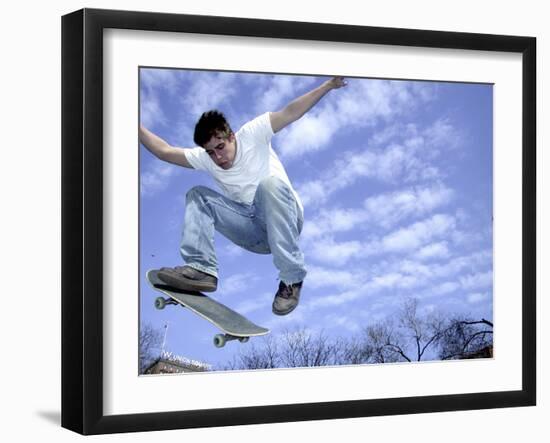 Skateboarder in Midair-null-Framed Photographic Print