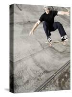 Skateboarder Performing Tricks-null-Stretched Canvas