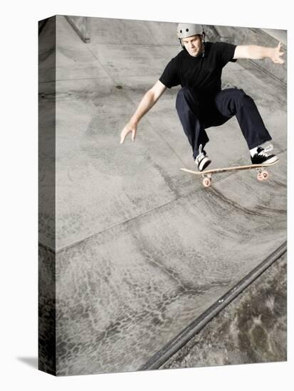 Skateboarder Performing Tricks-null-Stretched Canvas