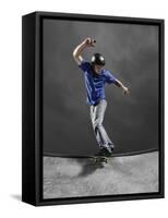 Skateboarder Performing Tricks-null-Framed Stretched Canvas