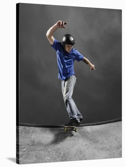 Skateboarder Performing Tricks-null-Stretched Canvas