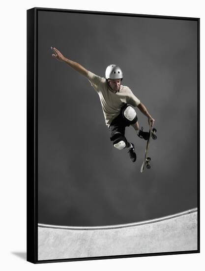 Skateboarder Performing Tricks-null-Framed Stretched Canvas